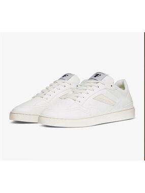 Thousand Fell Court’s in white sneaker